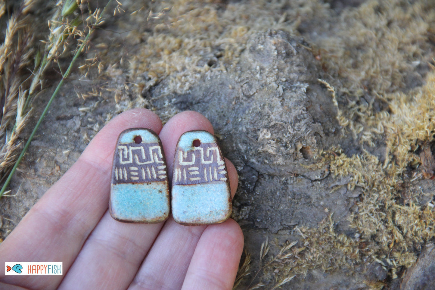 A pair of rustic flat ceramic earring dangles