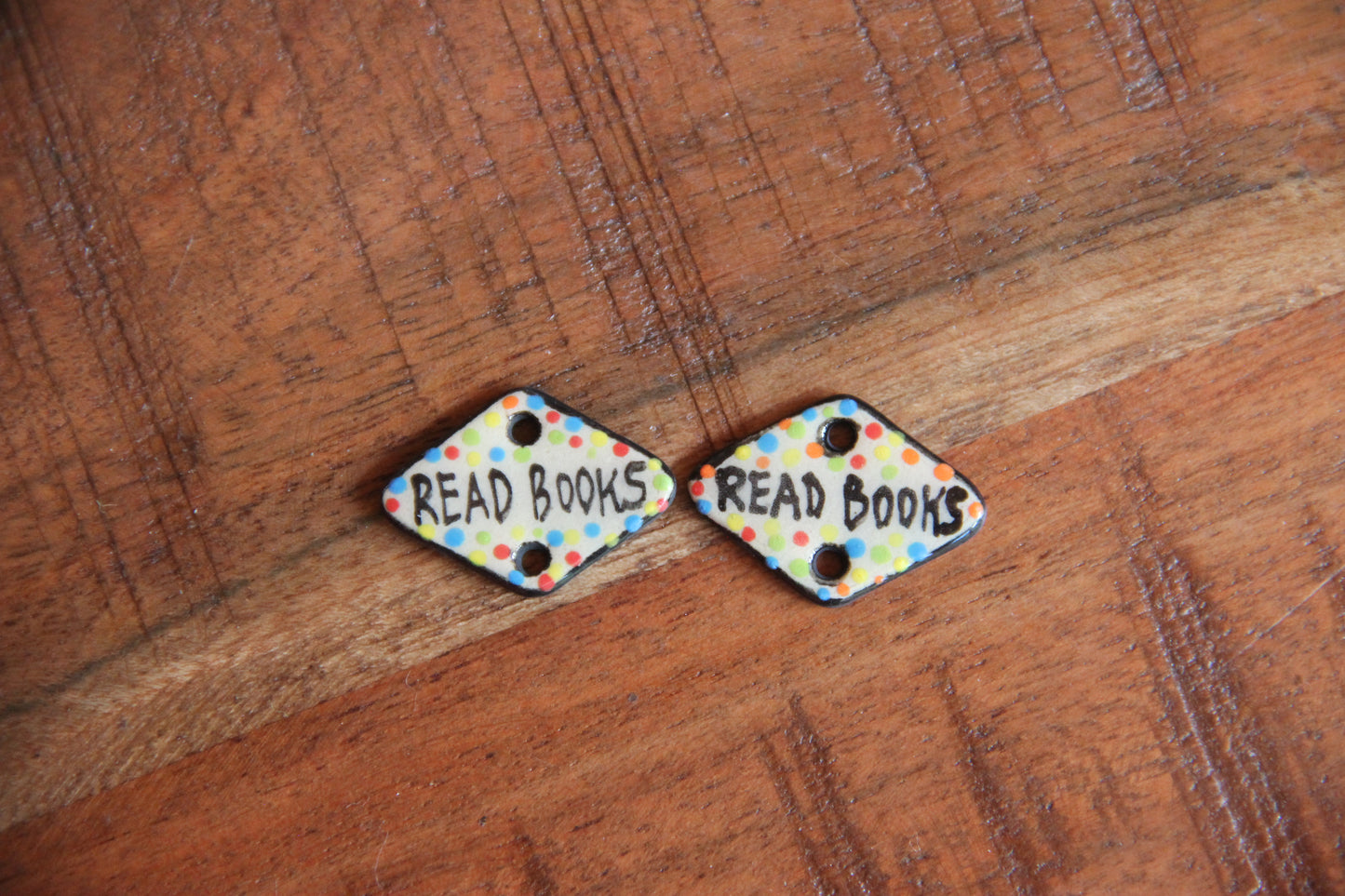 READ BOOKS - a pair of ceramic CONNECTORS