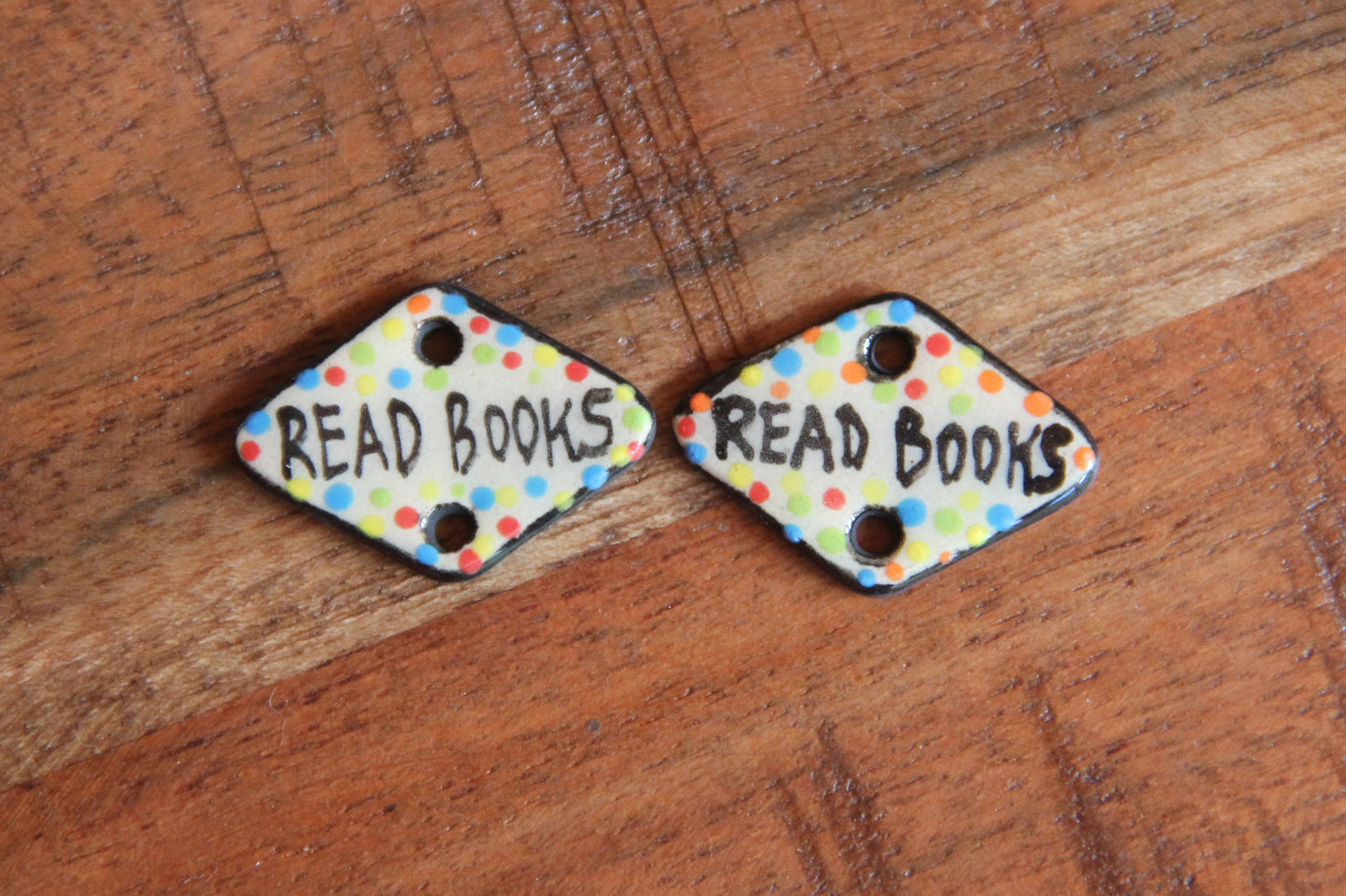 READ BOOKS - a pair of ceramic CONNECTORS