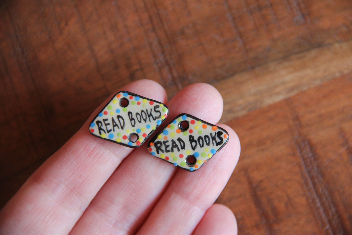 READ BOOKS - a pair of ceramic CONNECTORS