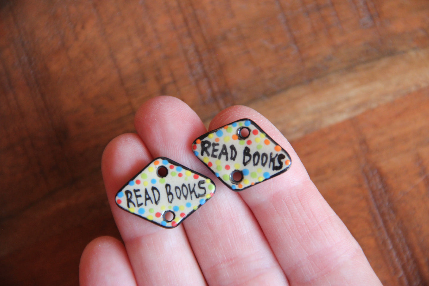 READ BOOKS - a pair of ceramic CONNECTORS