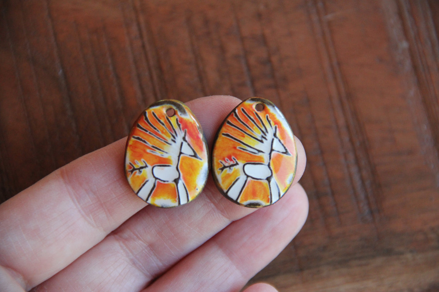 A pair of ceramic earring dangles