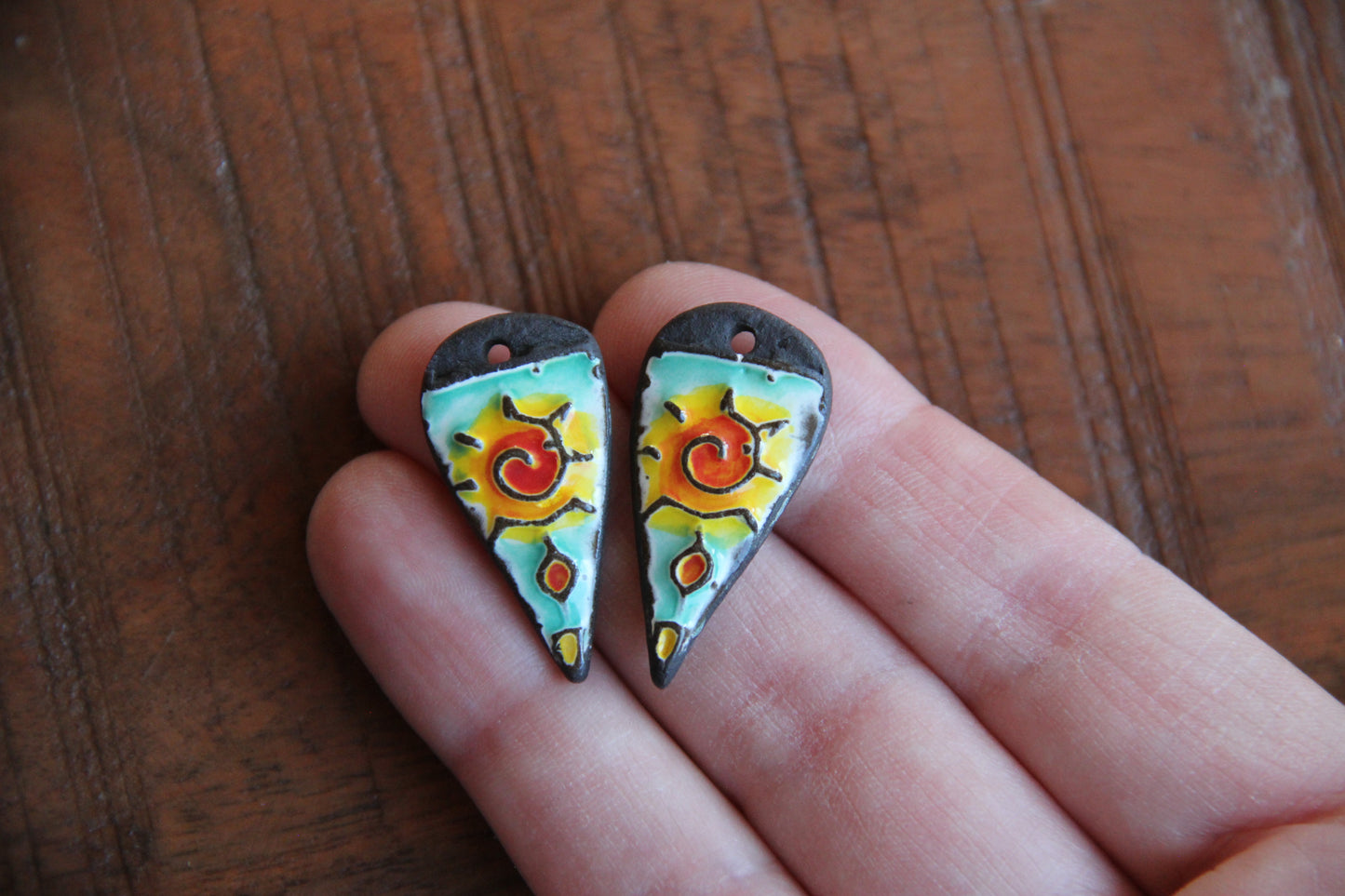 A pair of ceramic earring dangles