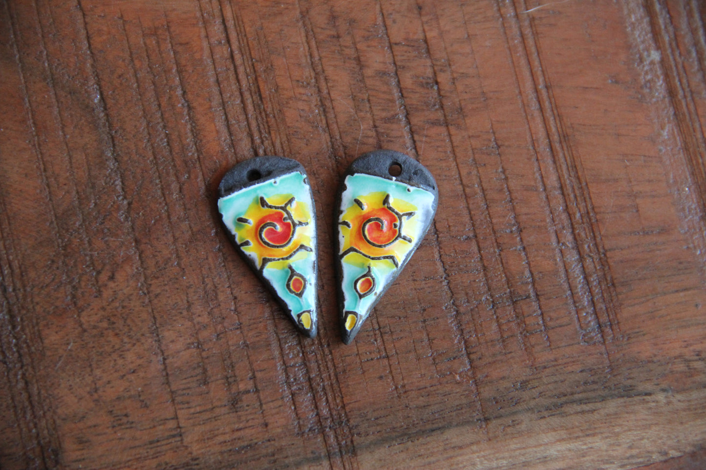 A pair of ceramic earring dangles
