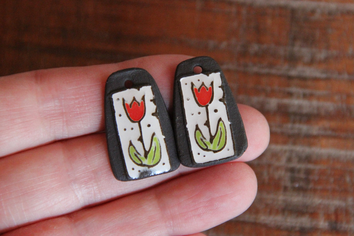 A pair of TULIPS ceramic earring dangles