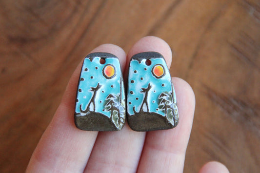 HOWLING WOLVES - a pair of ceramic earring dangles