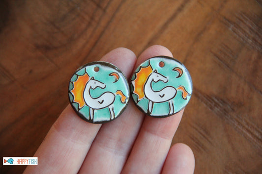 A pair of ceramic earring dangles