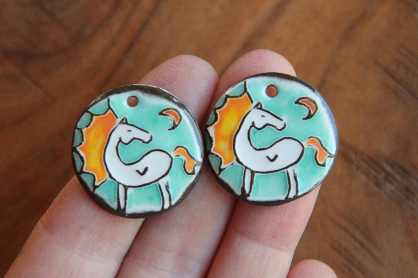 A pair of ceramic earring dangles