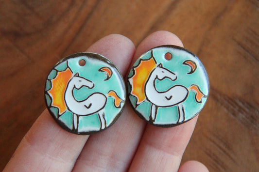 A pair of ceramic earring dangles