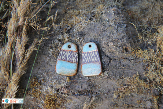 A pair of rustic flat ceramic earring dangles