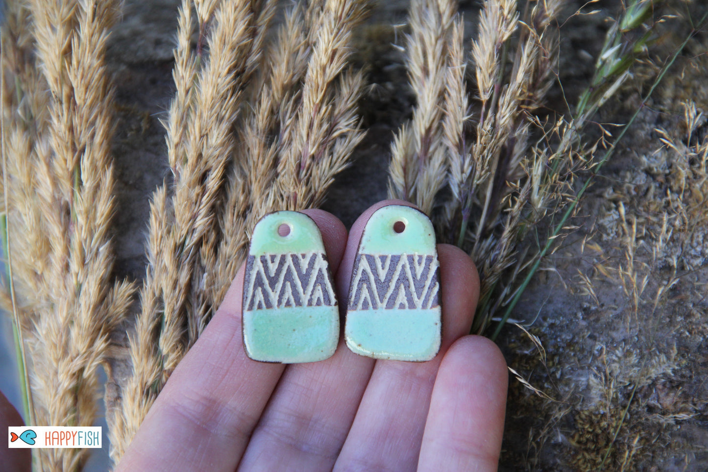 A pair of rustic flat ceramic earring dangles
