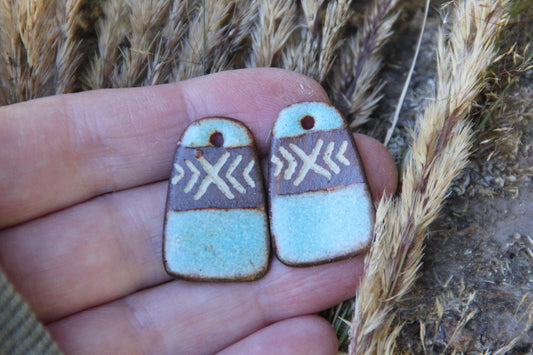 A pair of rustic flat ceramic earring dangles