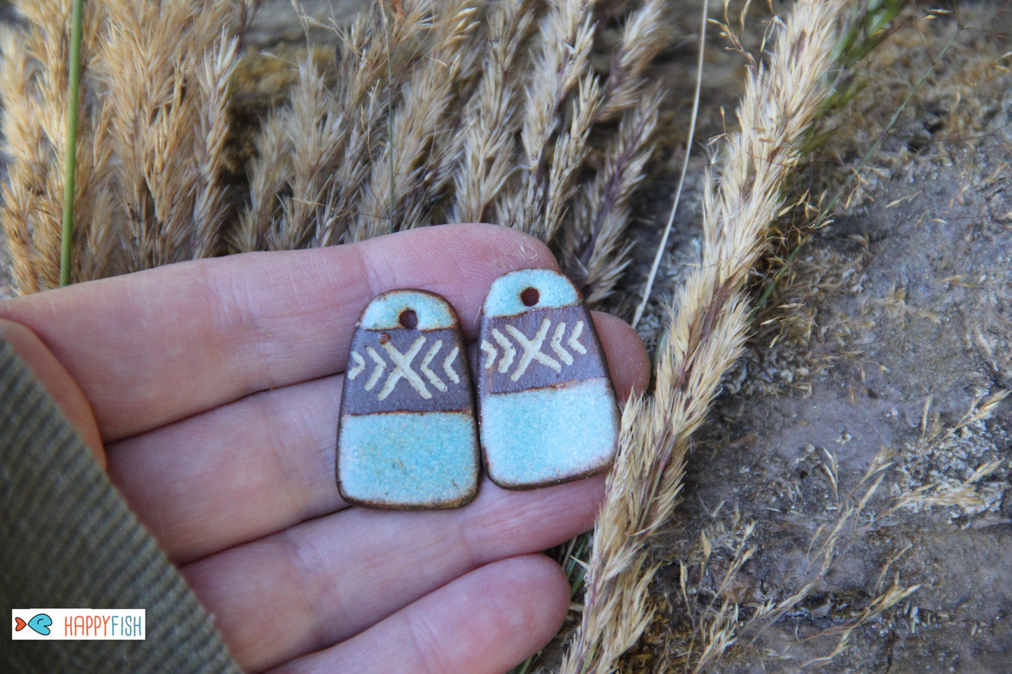 A pair of rustic flat ceramic earring dangles