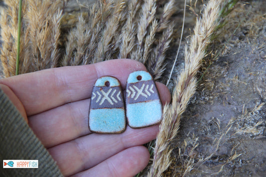 A pair of rustic flat ceramic earring dangles