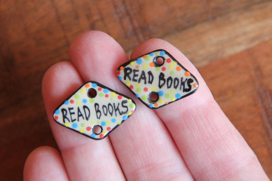 READ BOOKS - a pair of ceramic CONNECTORS