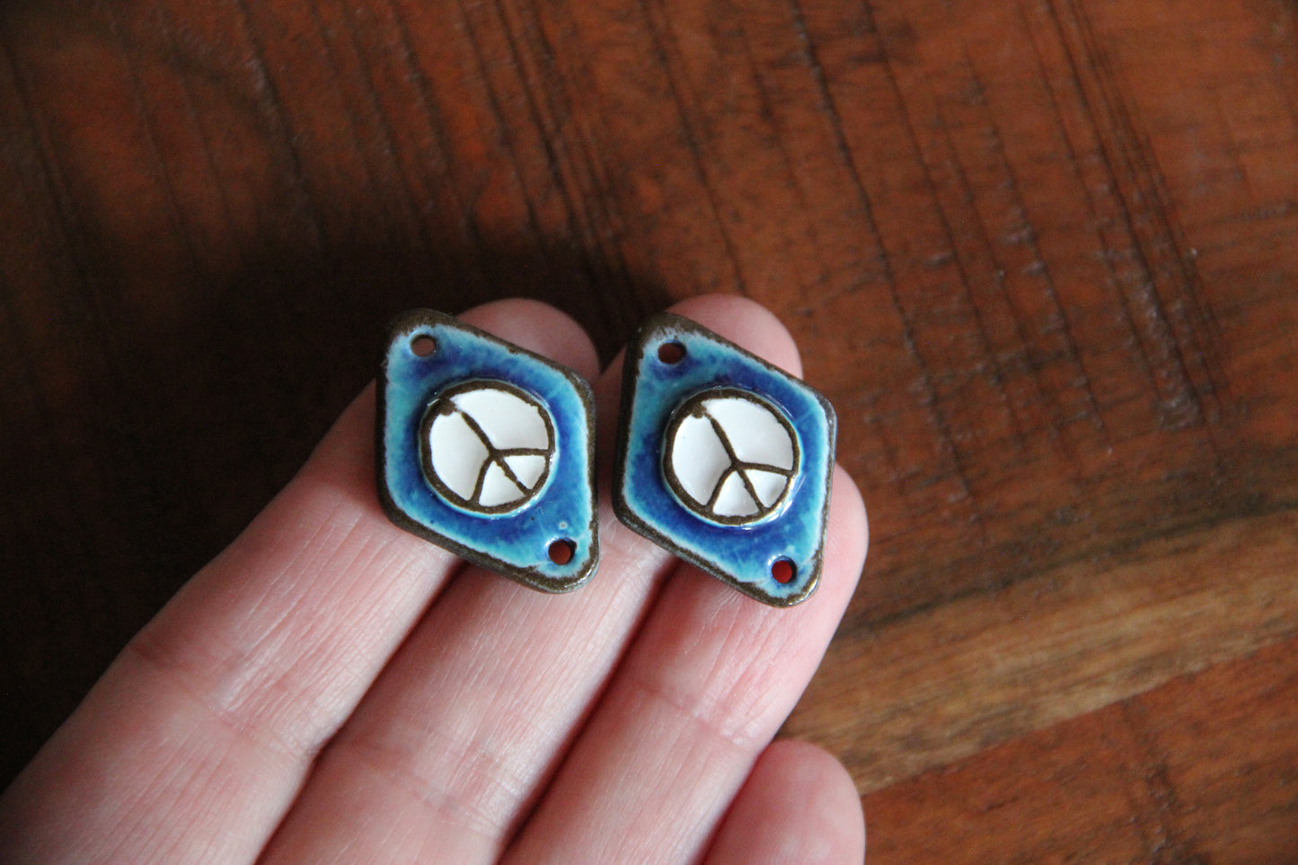 A pair of PEACE ceramic earring CONNECTORS