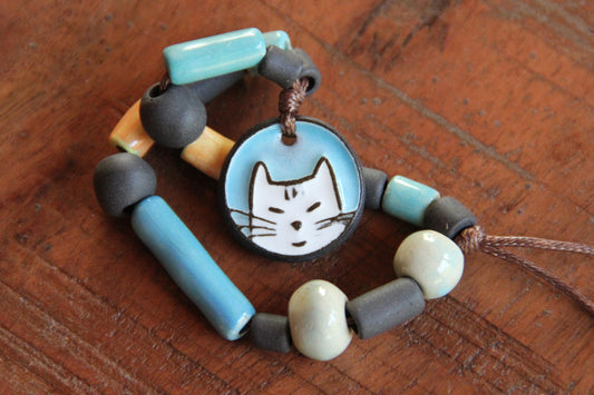 Bracelet set with a kitty charm