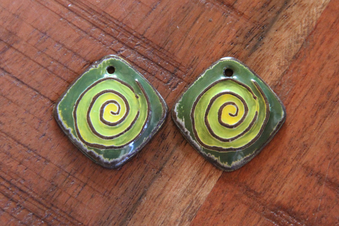 A pair of SPIRAL ceramic earring dangles