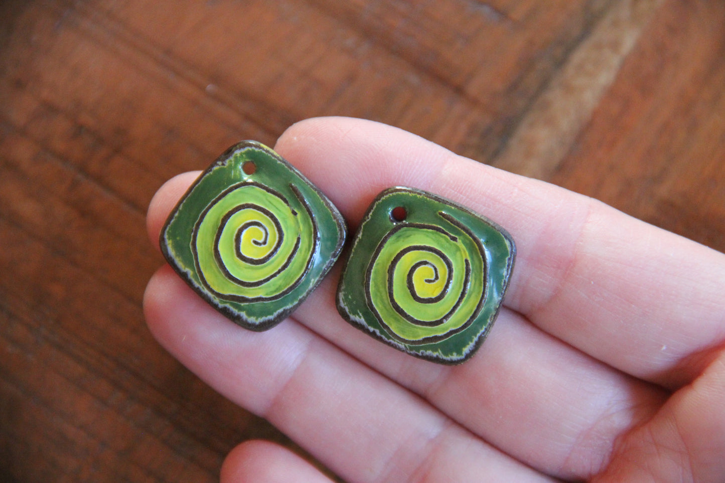 A pair of SPIRAL ceramic earring dangles