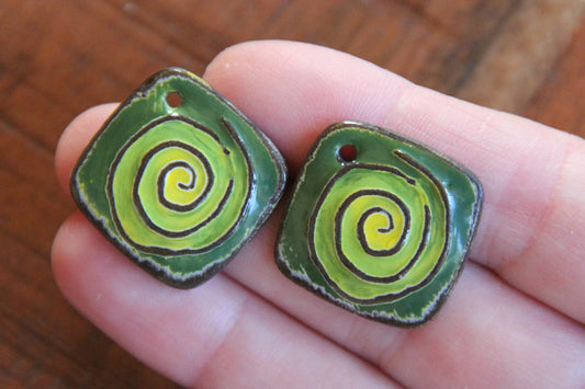 A pair of SPIRAL ceramic earring dangles