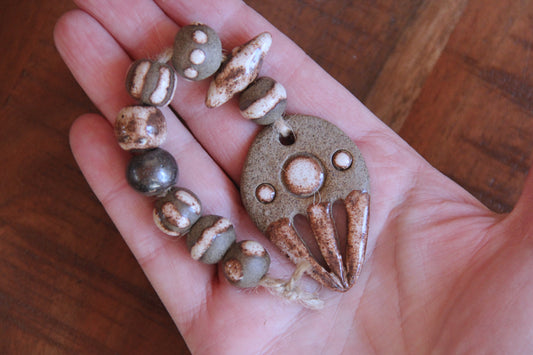 SET of 9 beads and a pendant. rustic earthy stoneware BEADS