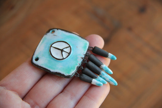 PEACE Pendant with attached spike beads