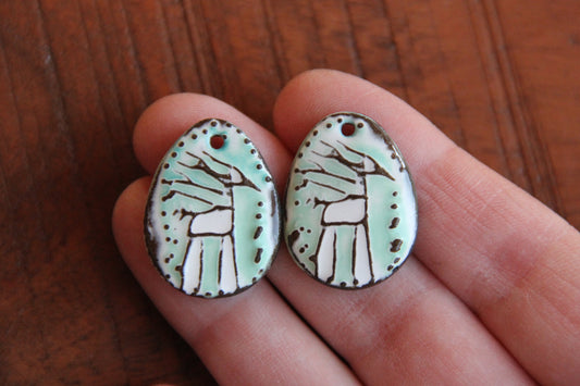 A pair of ceramic earring dangles
