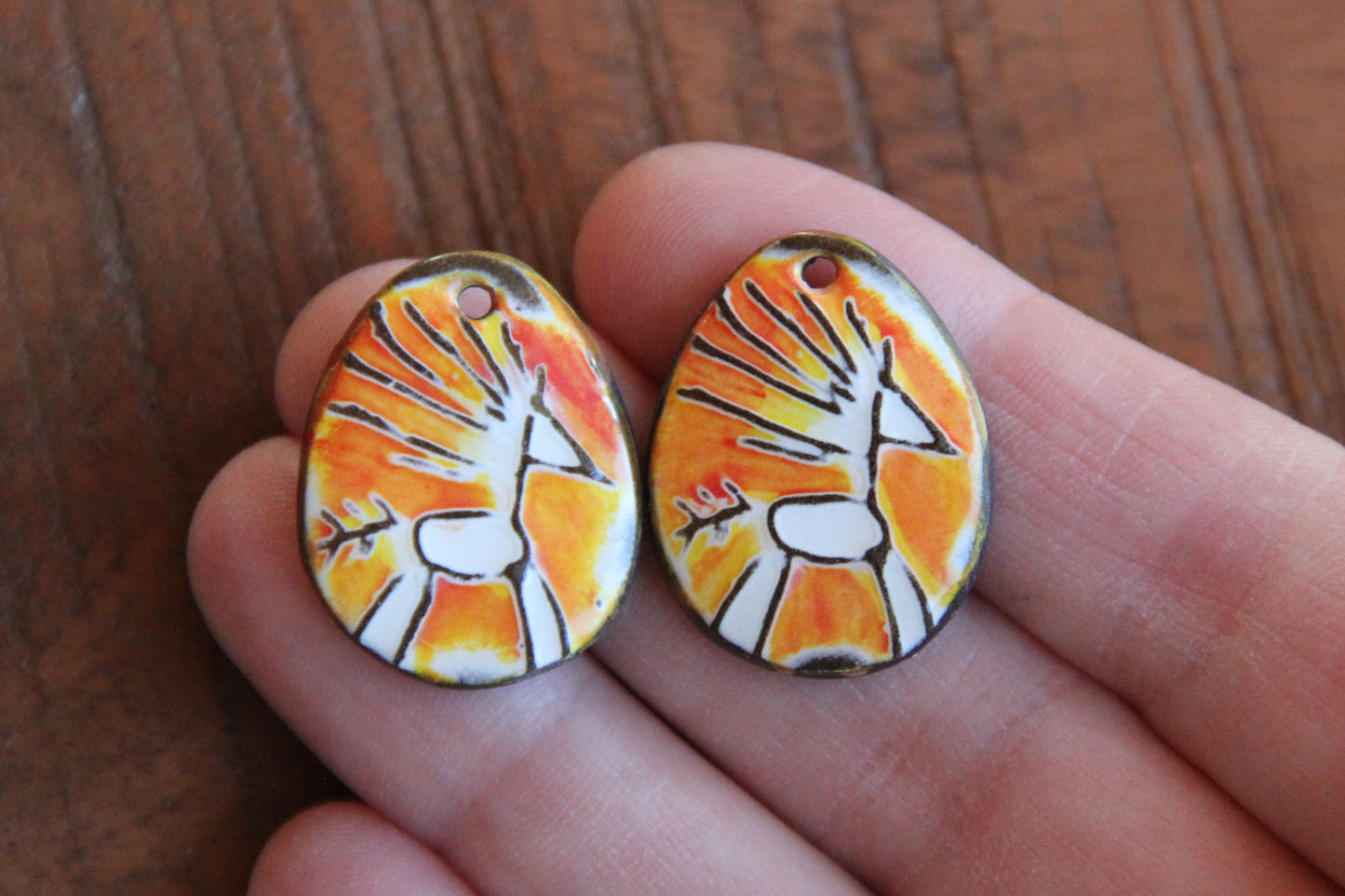 A pair of ceramic earring dangles