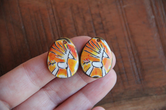 A pair of ceramic earring dangles
