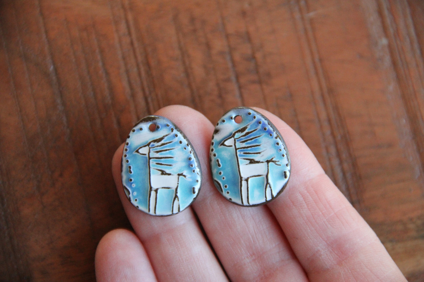 A pair of ceramic earring dangles