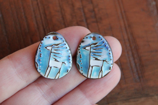 A pair of ceramic earring dangles