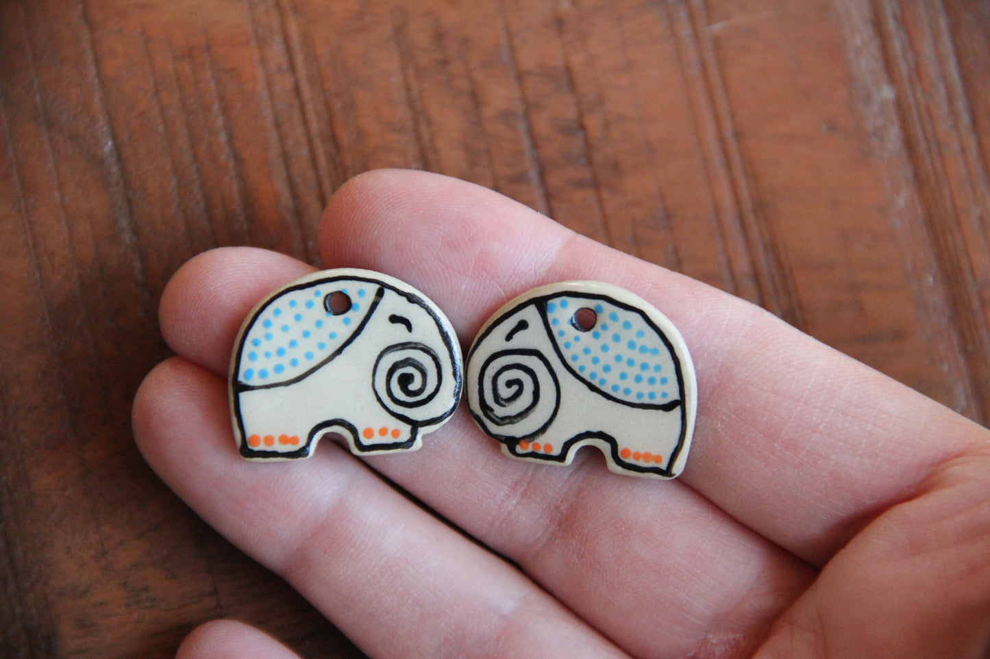 A pair of ceramic earring ELEPHANT dangles