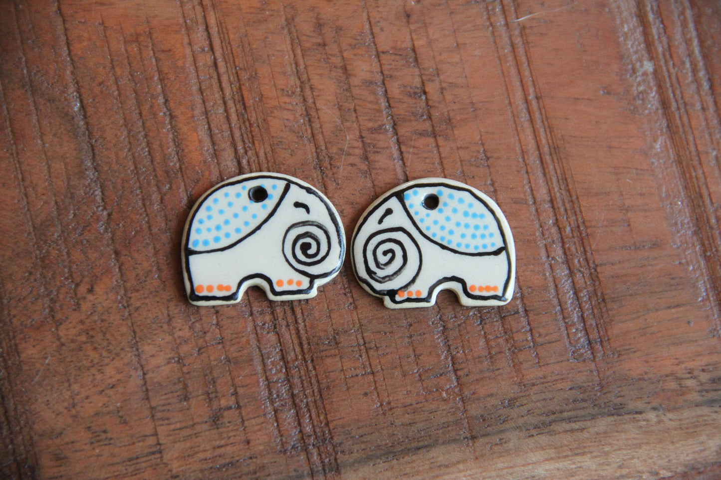 A pair of ceramic earring ELEPHANT dangles