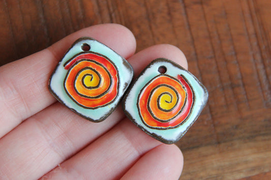 A pair of SPIRAL ceramic earring dangles