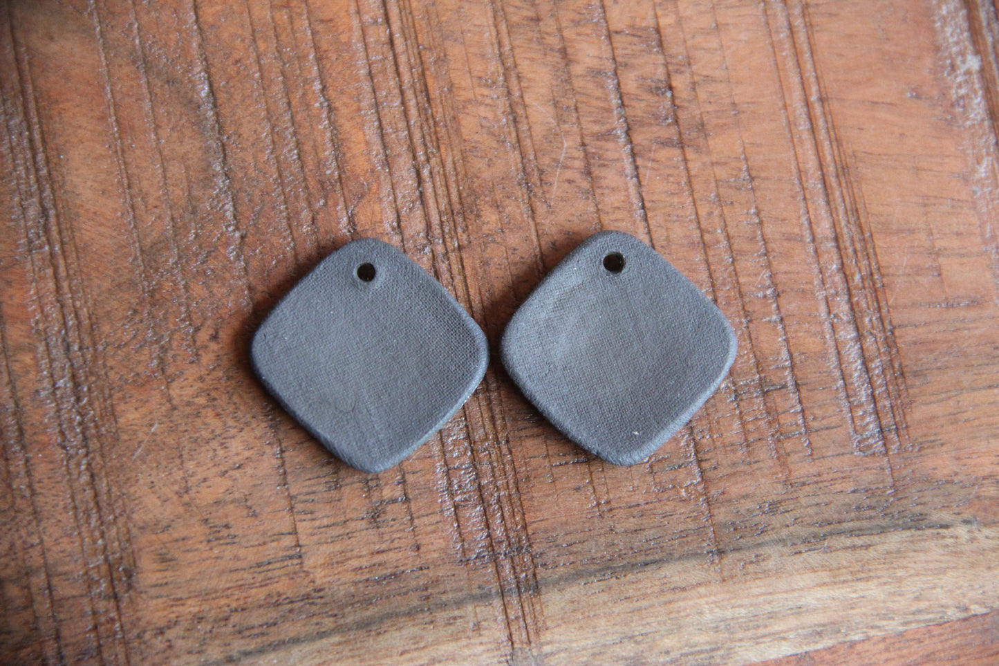 A pair of SPIRAL ceramic earring dangles