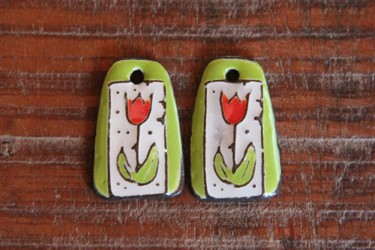 A pair of TULIPS ceramic earring dangles