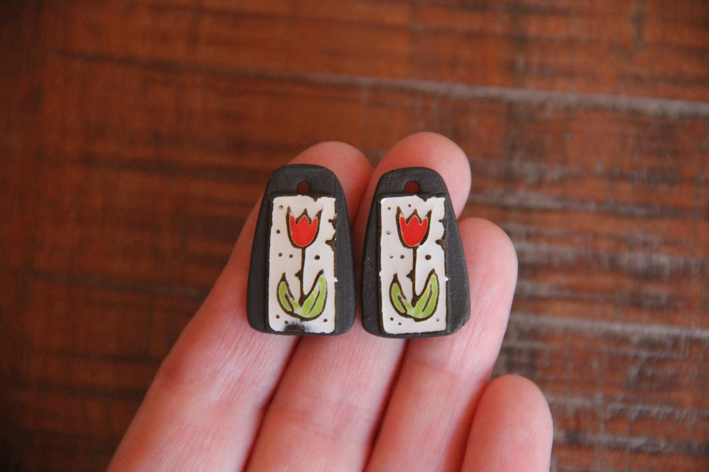 A pair of TULIPS ceramic earring dangles