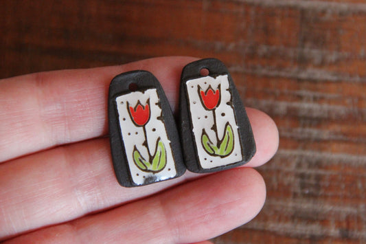 A pair of TULIPS ceramic earring dangles