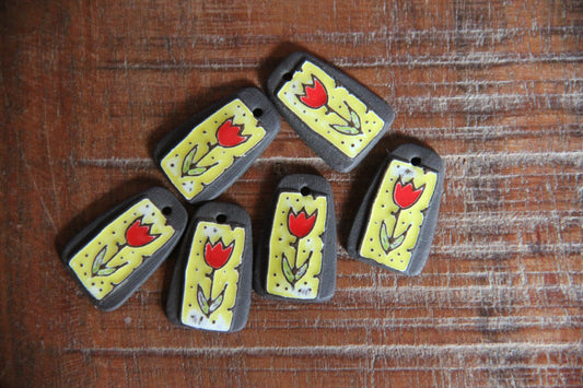 A pair of TULIPS ceramic earring dangles