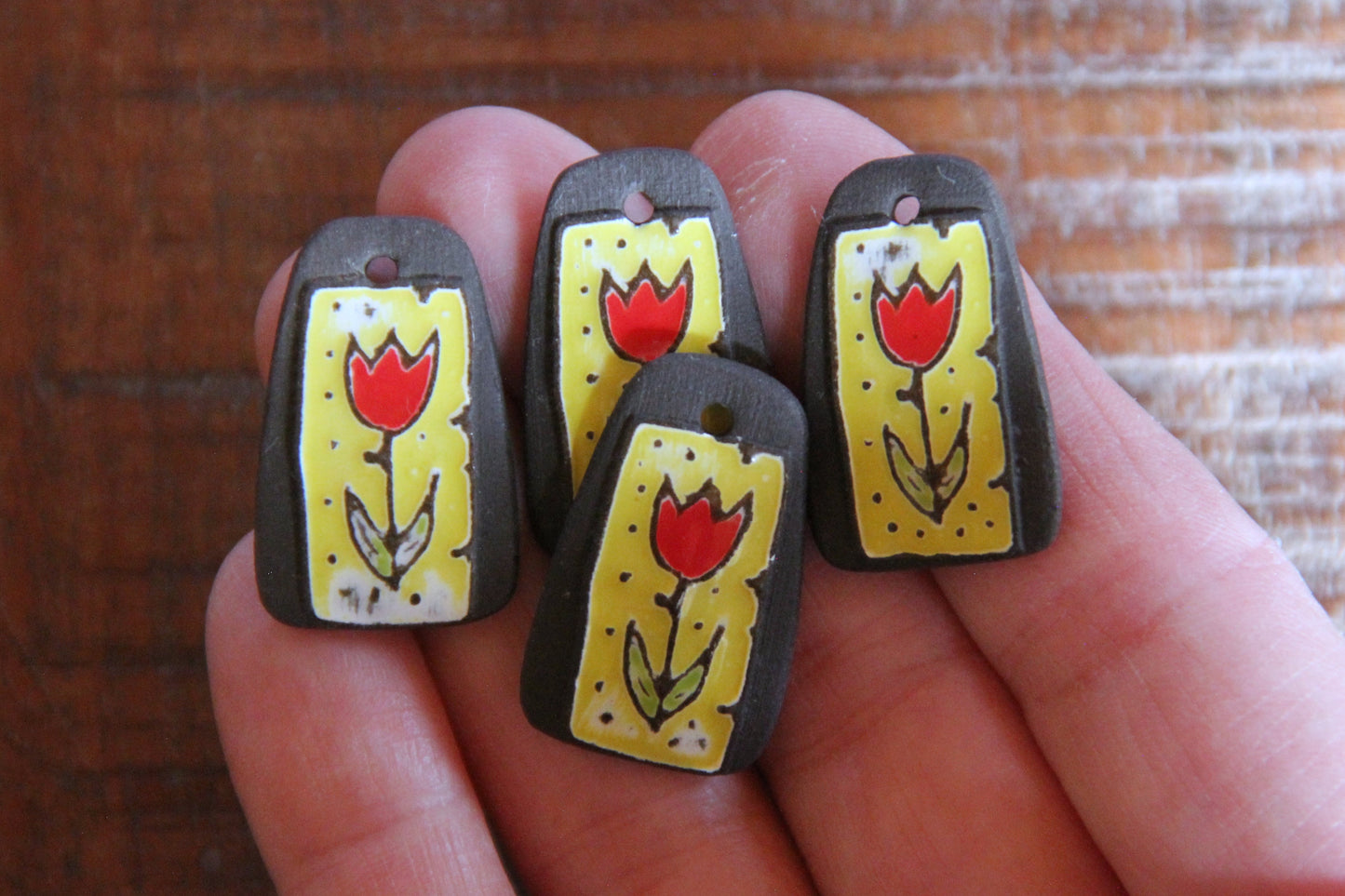 A pair of TULIPS ceramic earring dangles