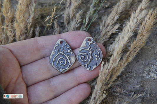 AU NATUREL - A pair of rustic natural ceramic earring dangles