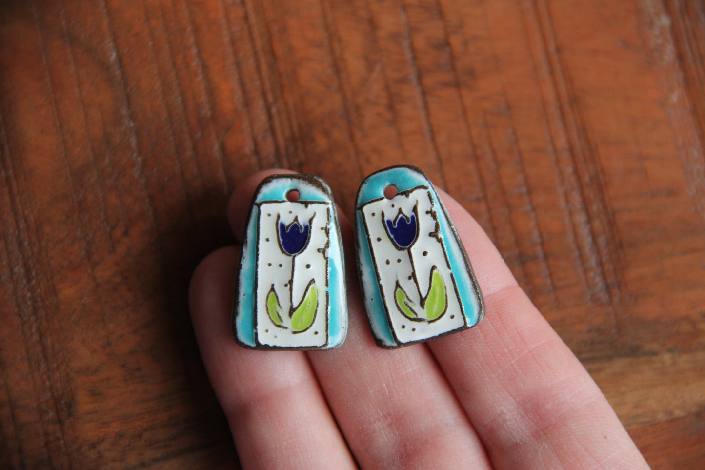 A pair of TULIPS ceramic earring dangles